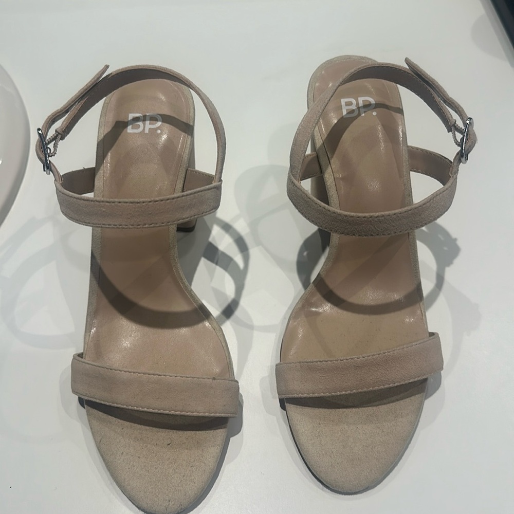 brand new healed sandal with a block heel.